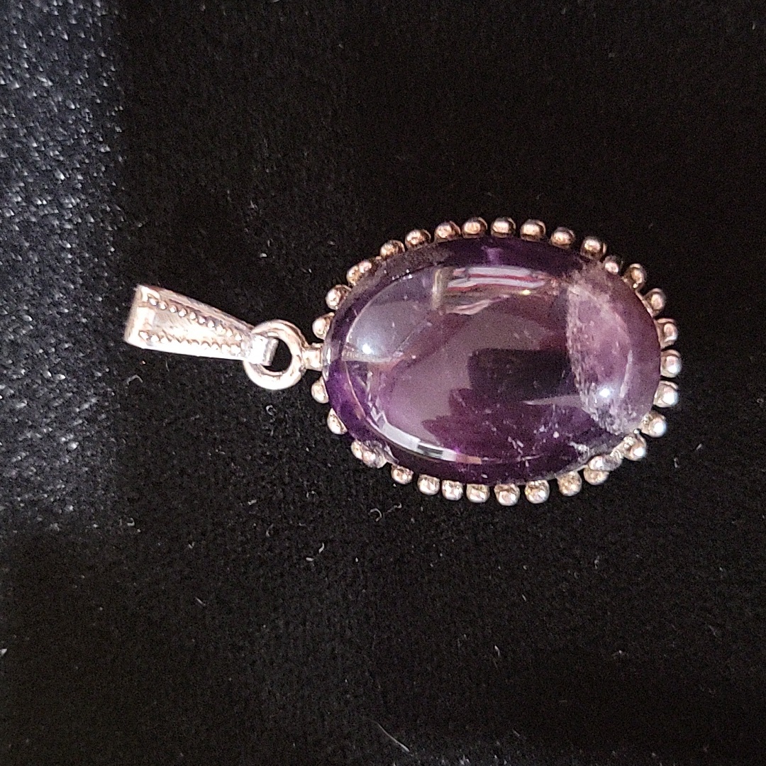 Handceafted Sterling Silver And Amethyst Pendant